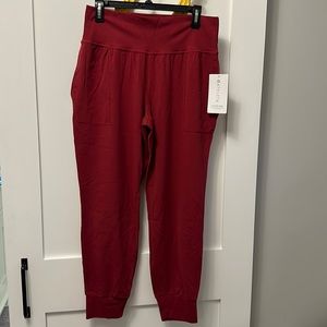 Athleta salutation joggers sz large maroon/wine color